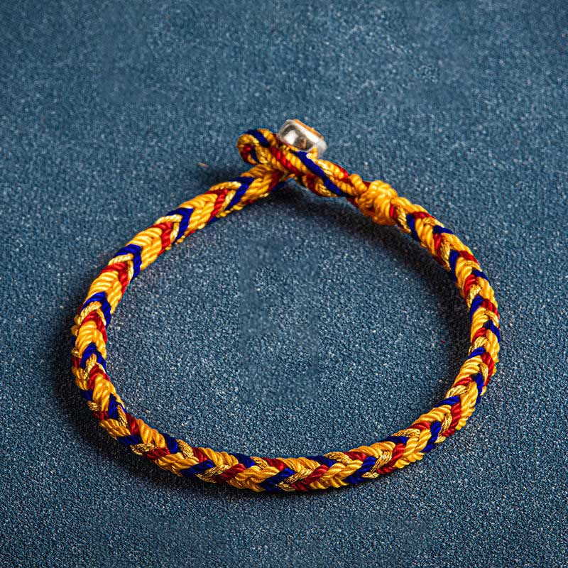Mehrfarbiges Armband Flachlage gelb blau rot geflochten Schutz Glück Armband Mehrfarbig