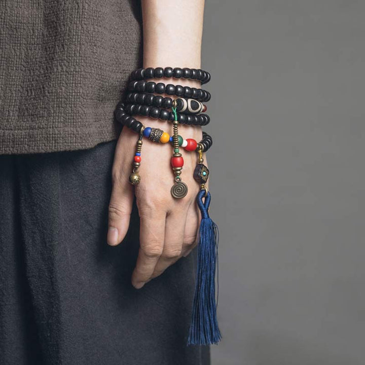 Mala Kupfer Ebenholz – Balance Armband mehrsträngig am Handgelenk getragen.
