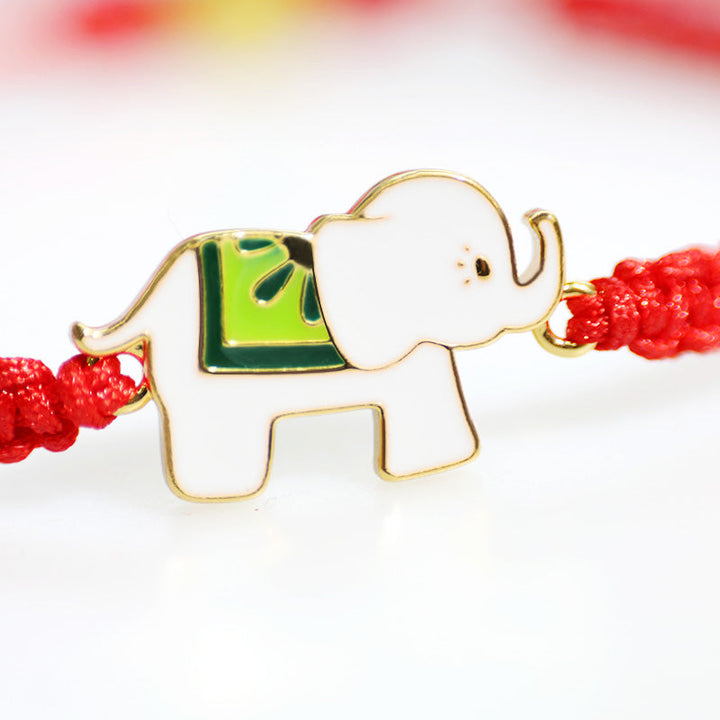 Elefant Armband mit roten Perlen Glücksbringer Schmuck vergoldet.