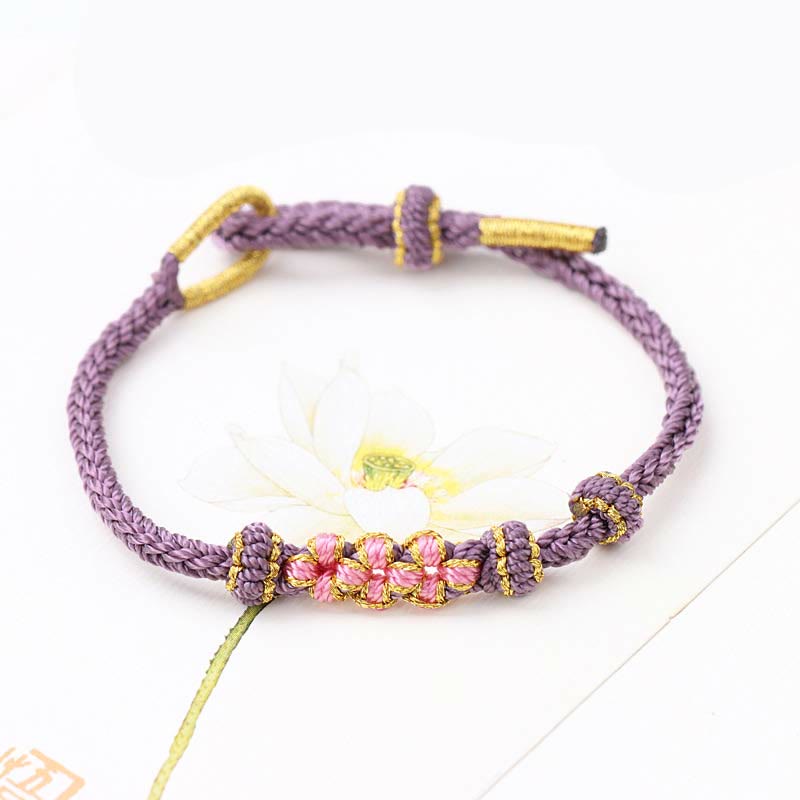 Armband Pfirsichblüte – Glück lila goldene Perlen Handgelenk