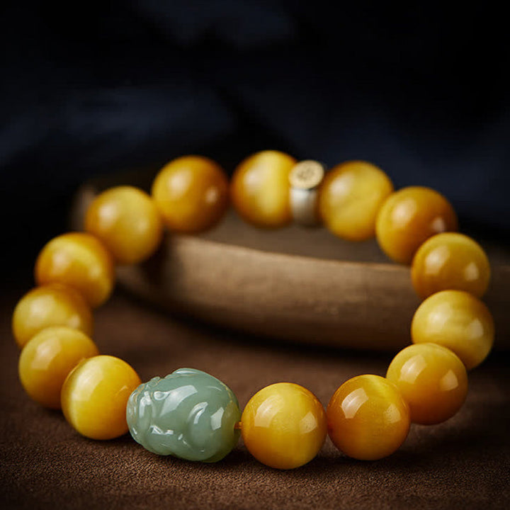 Armband mit goldenem Tigerauge und grüner Jade Perle Schutz