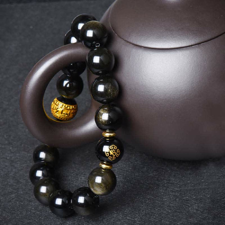 Obsidian Armband mit goldenen Elementen, elegantes Chinesisches Tierkreis Design Schutz.