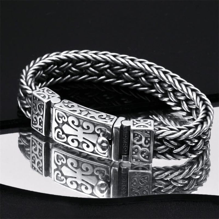 Silbernes geflochtenes Armband – Heilung Harmonie mit Ornamentschließe