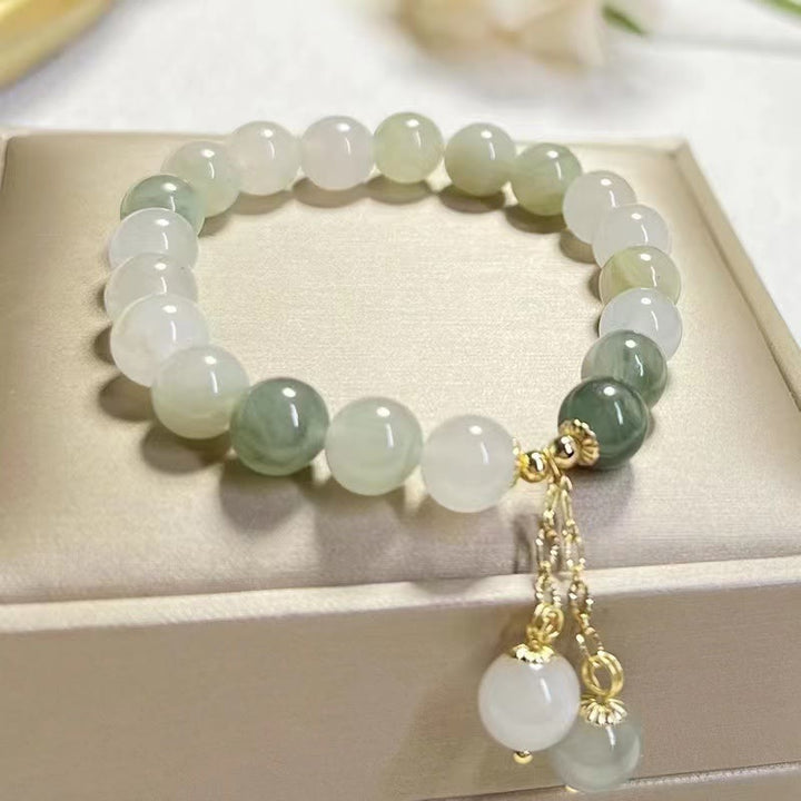 Armband Jade – Glück & Fülle & Balance, grüne und weiße Perlen elastisch