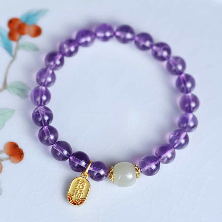 Armband Amethyst Kristall mit Jade Anhänger elastisch getragen
