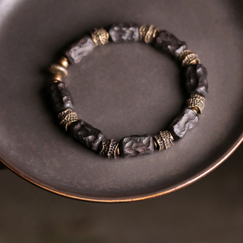 Armband Kupfer Ebenholz schwarze Perlen goldene Metallperlen elastisch elegant