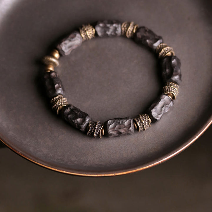 Armband Kupfer Ebenholz schwarze Perlen goldene Metallperlen elastisch elegant
