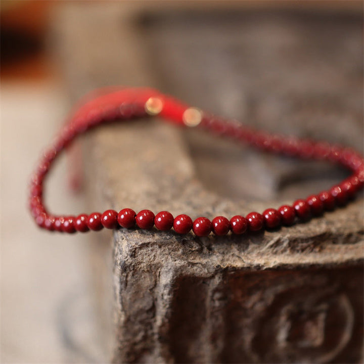Rotes Zinnober Armband Segen Energie Naturstein elastisch getragen