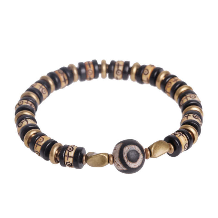 Armband Ebenholz mit bronzefarbenen Perlen Stärke und Energie