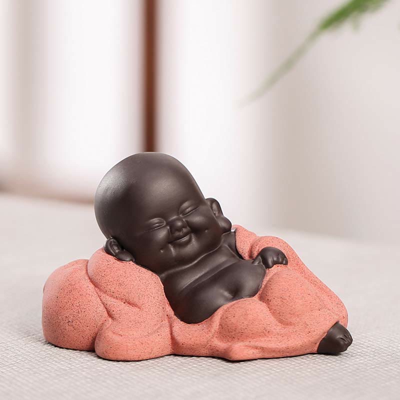 Lachender Buddha Gemütlicher kleiner Lachender Buddha