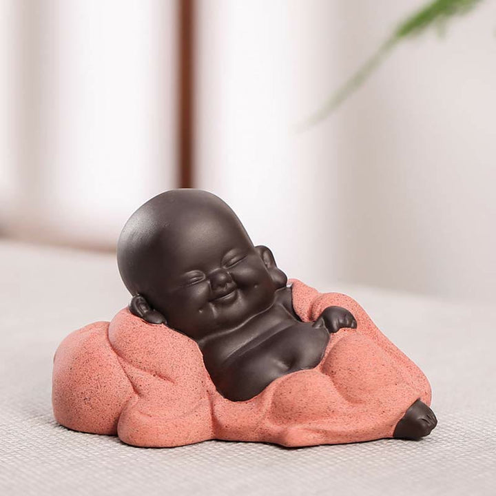 Lachender Buddha Gemütlicher kleiner Lachender Buddha