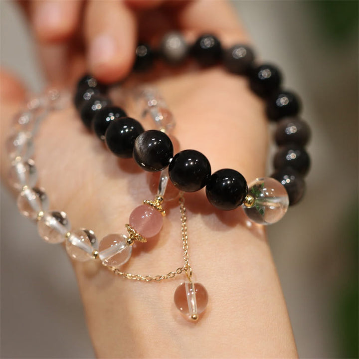 Obsidian Armband Silber mit weißem Kristall Yin Yang Schutz elegant.
