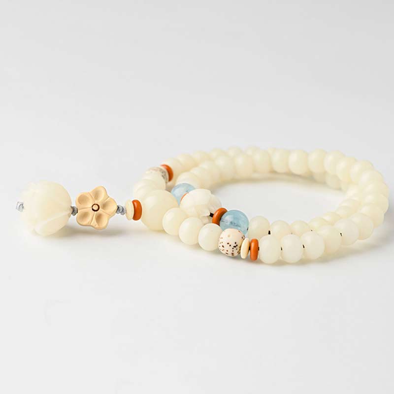 Armband Weiße Jade Bodhi Lotus Segen mit orangefarbenen Perlen elastisch