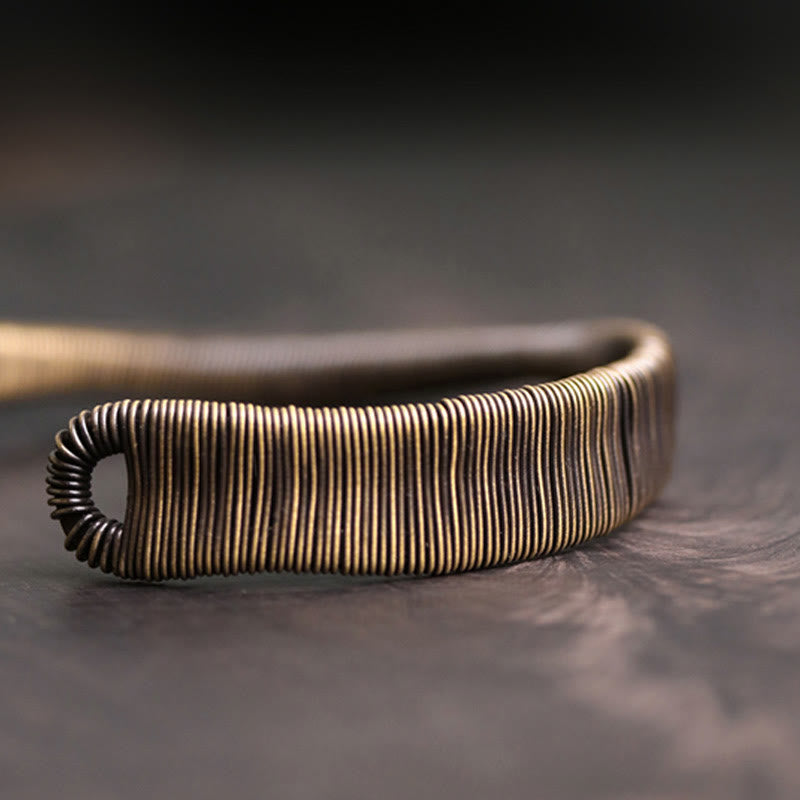 Kupfer Armband mit Spiralstruktur Glück Wohlstand Balance Design elegant