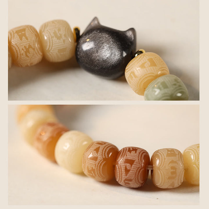 Armband mit schwarzem Obsidian und beigen Bodhi-Perlen Nahaufnahme.