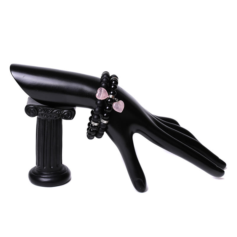 Schwarzes Kristall Armband mit rosa Steinen elegantes Paar Design Schutz