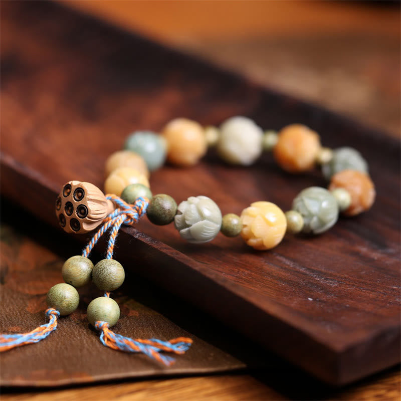 Sandelholz Bodhi Lotus Armband mit Perlen und Quasten elegant.