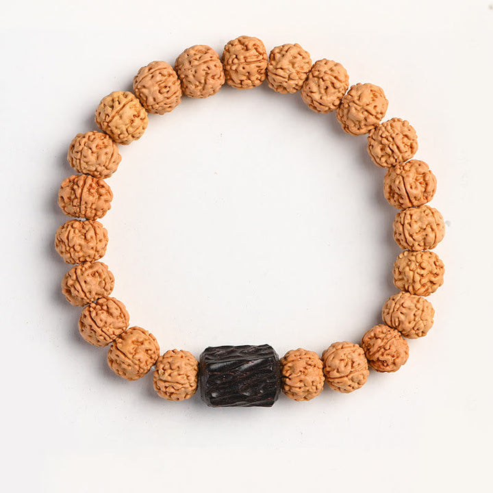 Armband Bodhi – Wohlstand mit braunen Samen und schwarzem Stein elastisch.