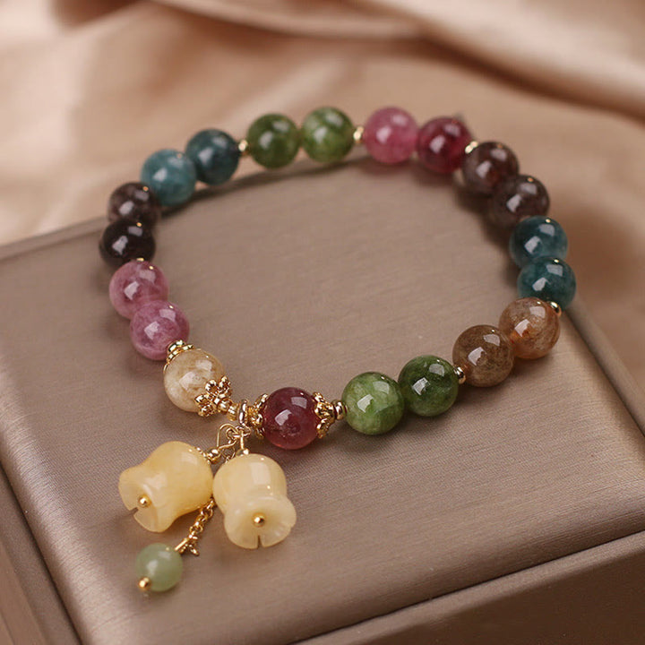 Buntes Turmalin Armband mit Blumen Perlen Anhänger elegant gestylt.