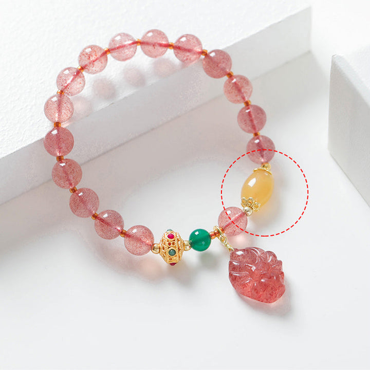 Armband Erdbeerquarz Fuchs – Heilung rosa Edelsteine goldene Verzierungen elastisch