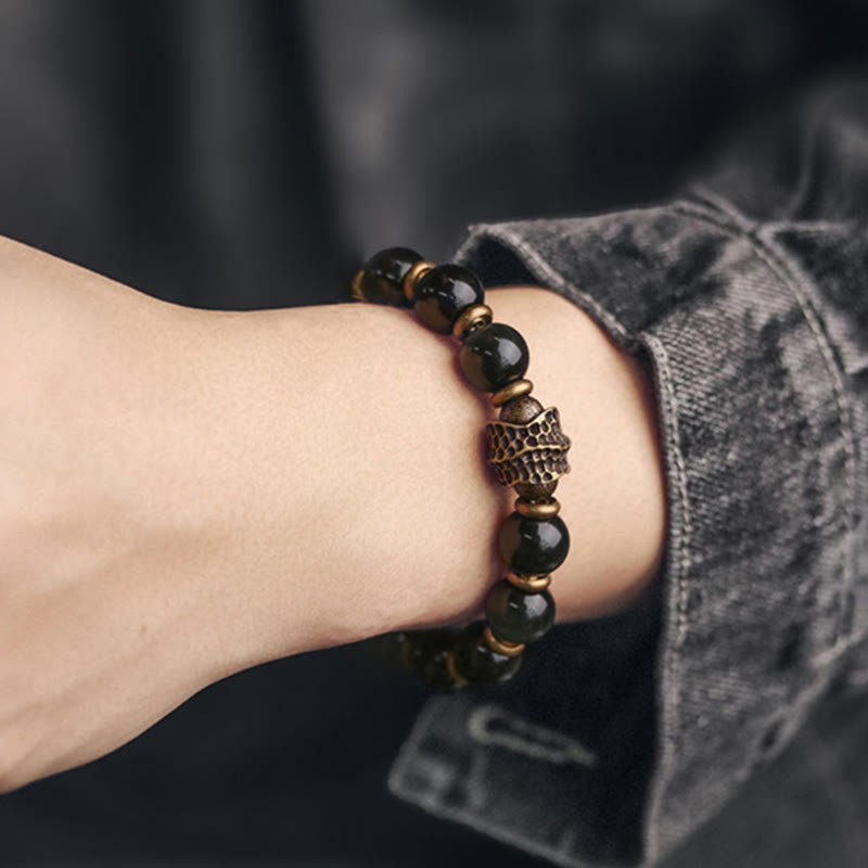 Armband Obsidian Kupfer schwarze Perlen Naturstein elastisch Handgelenk getragen