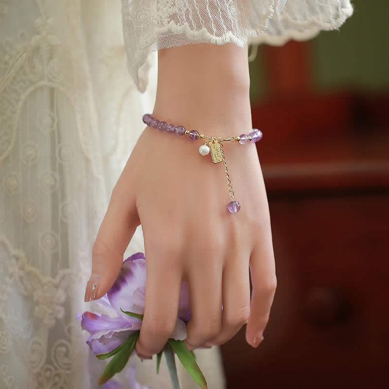 Armband Amethyst Kristall – Energie lila Perlen Blume Hand