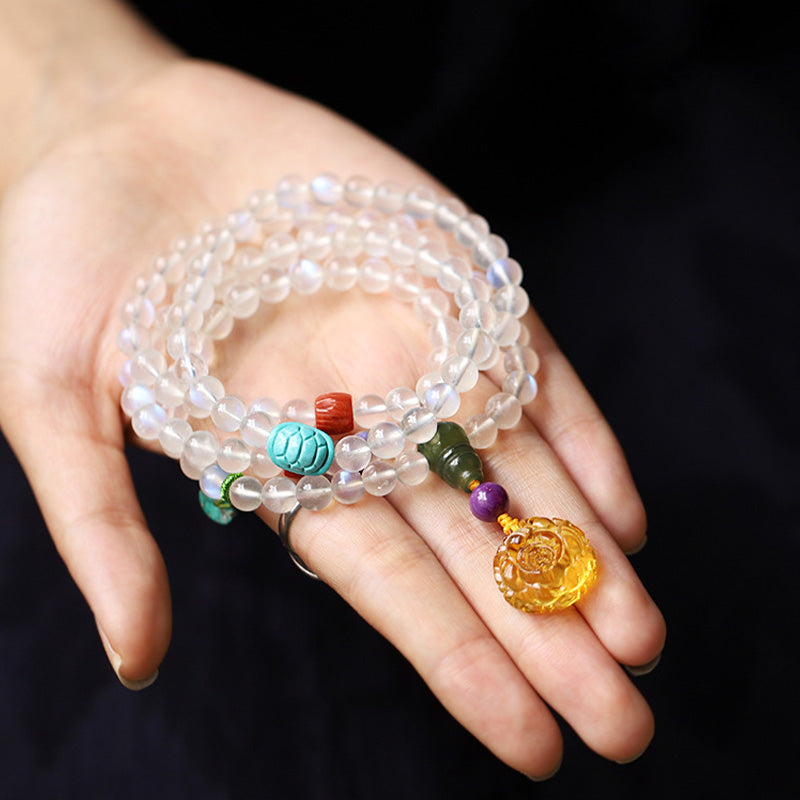 Mondstein Armband Türkis Lotus Anhänger Heilung elastisch Handgelenk getragen