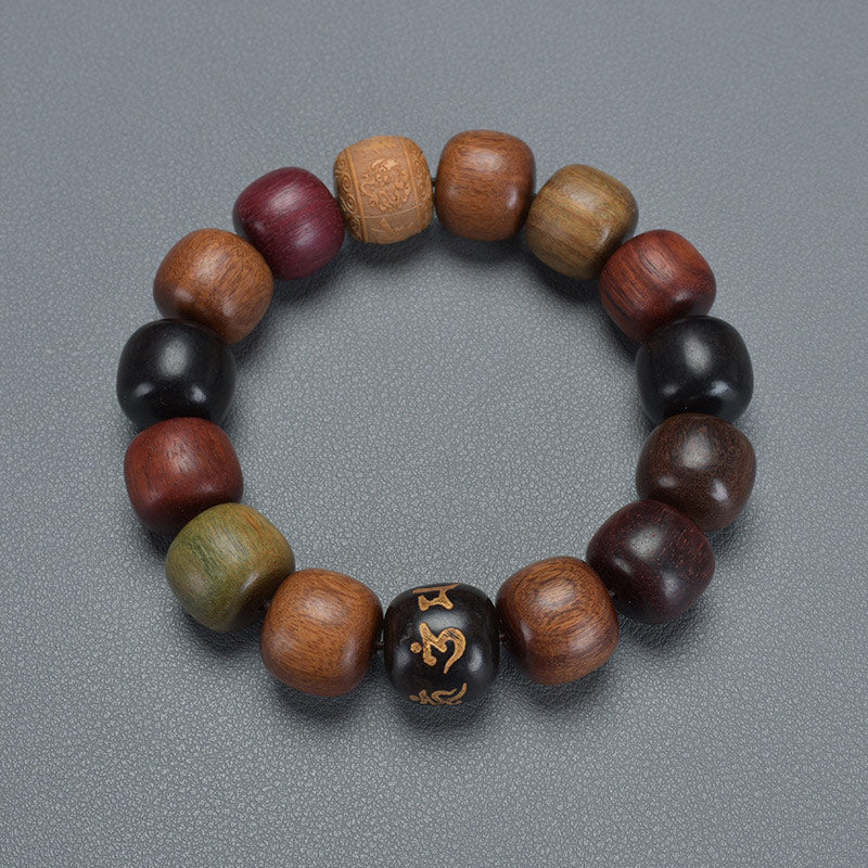 Holzperlen Armband mit Om Symbol schwarzer Mittelpunkt verschiedene Holztöne