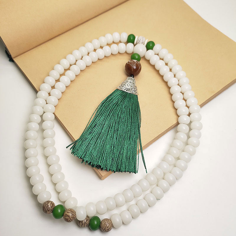 Weiße Jade Mala 108 Perlen Bodhi mit grünem Quast Tassel.
