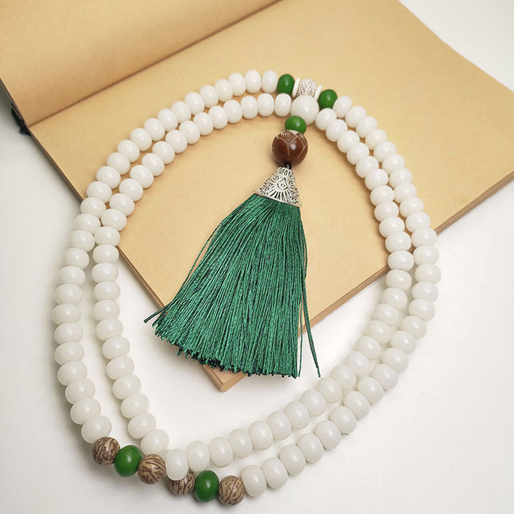 Weiße Jade Mala 108 Perlen Bodhi mit grünem Quast Tassel.