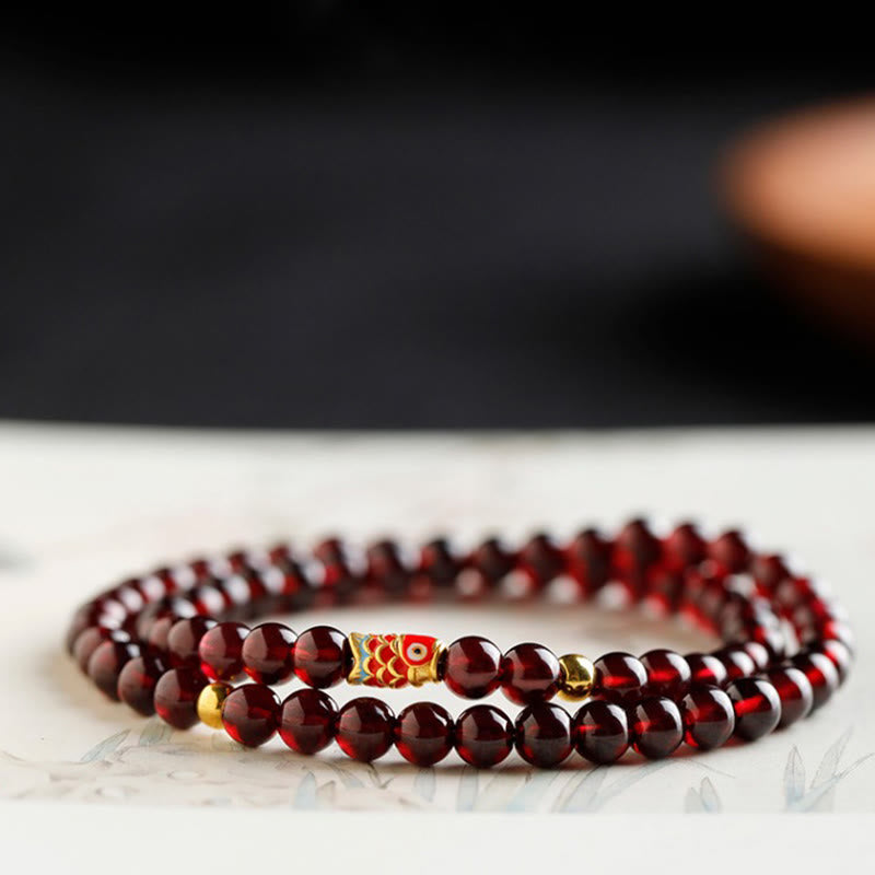 Armband Granat Koi Fisch – Schutz