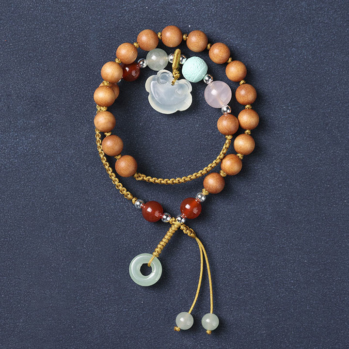 Armband Sandelholz mit Jade Anhänger Perlen elastisch Naturstein