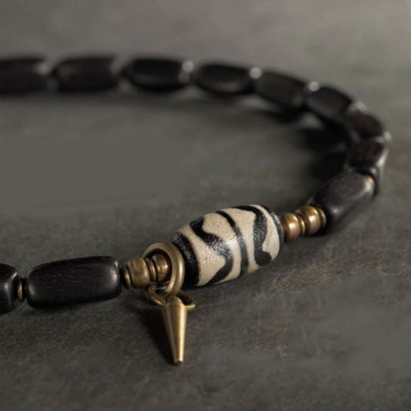 Armband Kupfer Ebenholz mit schwarzen Perlen und Anhänger elegant.