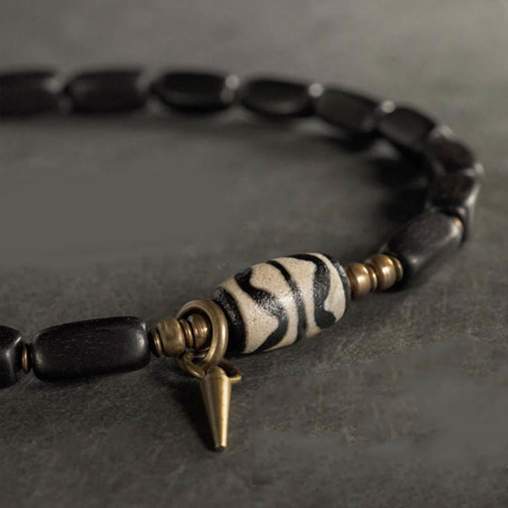 Armband Kupfer Ebenholz mit schwarzen Perlen und Anhänger elegant.