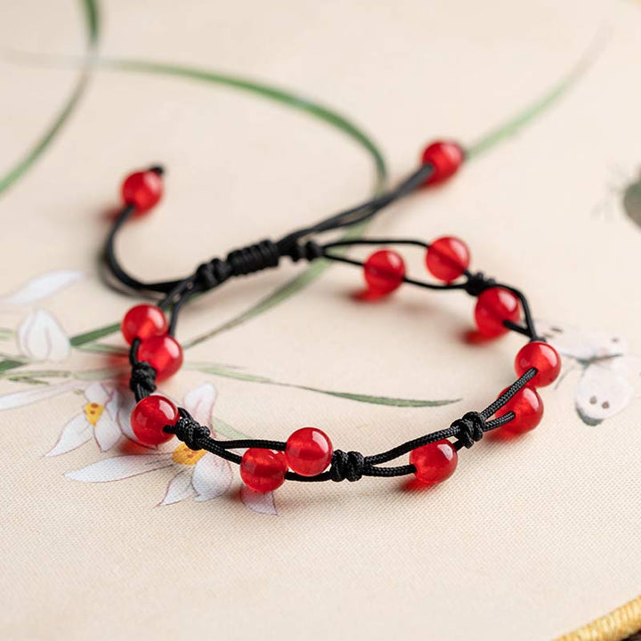 Armband Roter Achat Zinnober mit schwarzem Lederband elastisch.