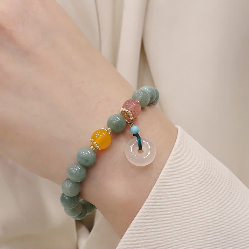Armband Cyan Jade Amethyst Lotus Heilung Frieden am Handgelenk getragen