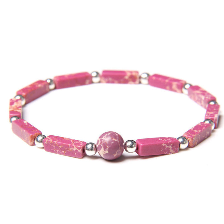 Elastisches Armband aus rosa Tigerauge mit Amethyst-Kugel und Metallperlen