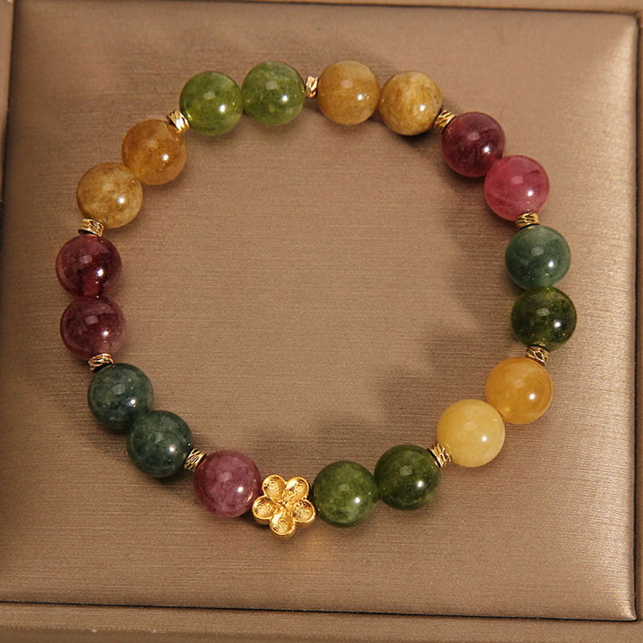 Buntes Tourmalin Armband mit goldener Blume Naturstein elastisch.