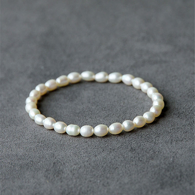 Armband Perle – Heilung weiße Süßwasserperlen elastisch elegant klassisch