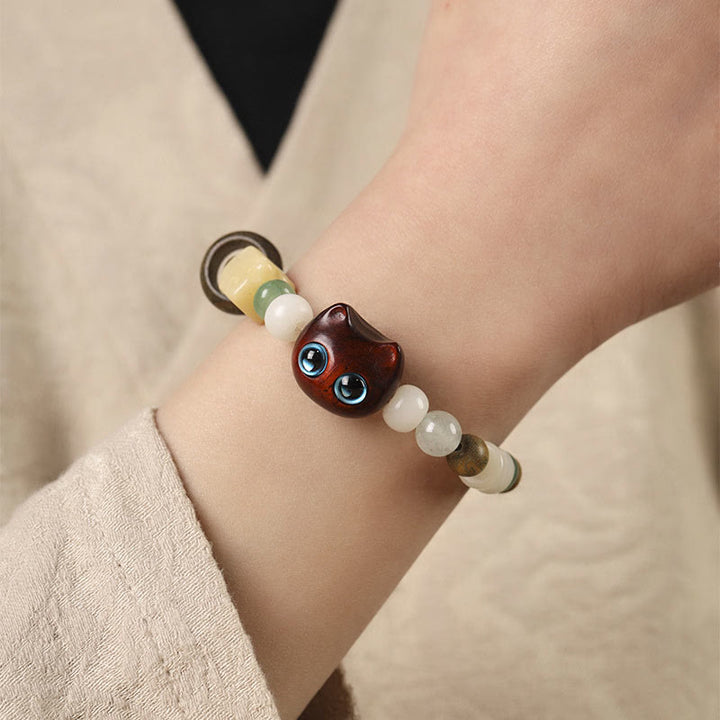 Armband Sandelholz Bodhi Katze Frieden Perlen elastisch Handgelenk getragen