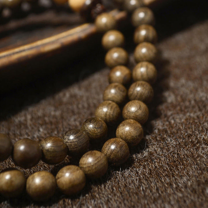 Mala Sandelholz – Schutz Perlenarmband braun glänzend Naturstein elegant