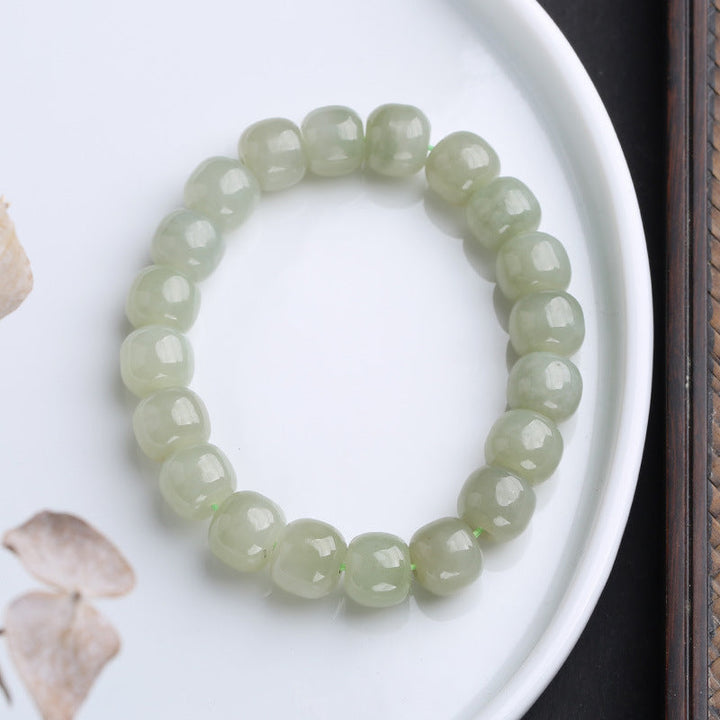 Jade Armband Glück Segen helles Grün Perlen Flachlage Weiß