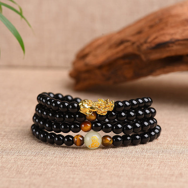 Obsidian Armband Chinesisches Tierkreis Pixiu goldener Verschluss schwarze Perlen Schutz.