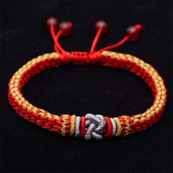 Rotes Armband – Glück & Liebe mit goldenen Perlen elegant gestaltet