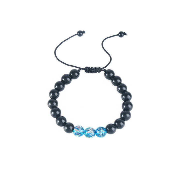 Armband Schwarzer Obsidian – Stärke mit blauen Kristallperlen elastisch