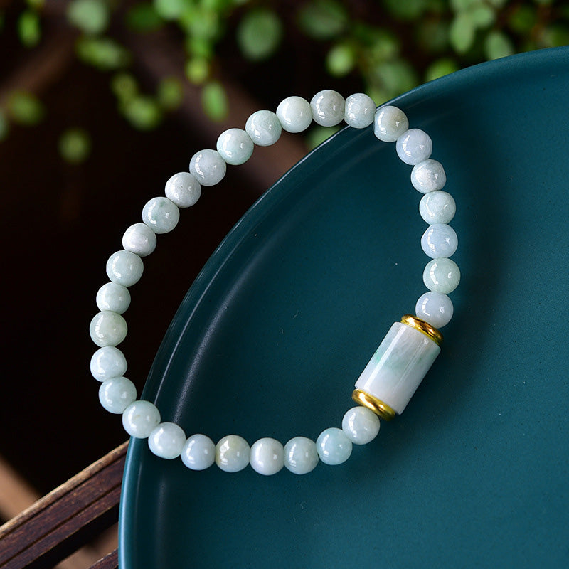 Jade Armband mit weißen Perlen und goldenem Zylinder Verschluss
