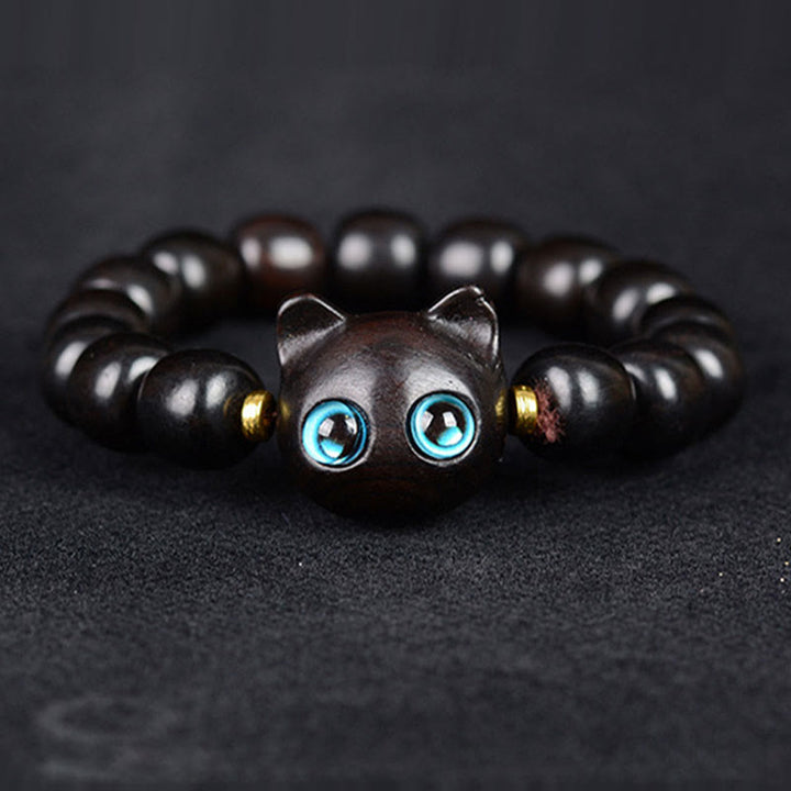 Schwarzes Ebenholz Katzen-Armband mit blauen Augen elegantes Design