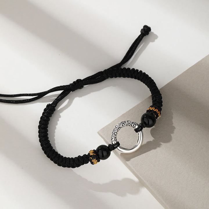 Schwarzes Armband mit Silber-Anhänger Frieden Glück elastisch Naturstein