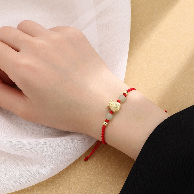 Jade Fu-Zeichen Armband rotes Seidenband Handgelenk getragen Glück Energie
