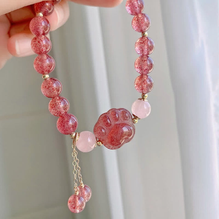 Armband Erdbeerquarz Kristall Katze rosa Perlen Handgelenk getragen elegant